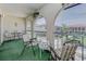 Enjoy the outdoors on this cozy balcony with serene courtyard views and arched entrances at 3690 Pinecrest St # 124, Sarasota, FL 34232