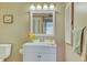 Bathroom featuring a white vanity and tiled floors at 3690 Pinecrest St # 124, Sarasota, FL 34232