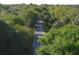 Scenic trail winding through a lush, green forest, perfect for walking, biking, and enjoying nature at 3690 Pinecrest St # 124, Sarasota, FL 34232