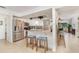 Eat-in kitchen featuring stainless steel appliances and granite countertops at 3736 Fontainebleau St, North Port, FL 34287