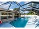 Sparkling screened in pool area with plenty of room for entertaining at 3736 Fontainebleau St, North Port, FL 34287