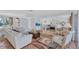 Bright and inviting living room seamlessly connects to the dining area, kitchen, and entryway at 3978 Lemonwood Dr, Sarasota, FL 34232