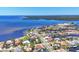 Stunning aerial view of the coastal neighborhood with waterfront homes, canals, and expansive ocean views at 4405 Harbor Blvd, Port Charlotte, FL 33952