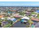 Picturesque aerial view of canal-front homes and properties, offering waterfront living at 4405 Harbor Blvd, Port Charlotte, FL 33952
