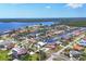 Stunning aerial view of waterfront homes with access to canals, a bay, and the Gulf of Mexico at 4405 Harbor Blvd, Port Charlotte, FL 33952