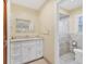 Bathroom showcasing the granite vanity, marble tile shower, and great natural light at 4405 Harbor Blvd, Port Charlotte, FL 33952