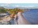 Sandy beach with picnic pavilion, offering a picturesque setting for community gatherings and beachfront enjoyment at 4405 Harbor Blvd, Port Charlotte, FL 33952