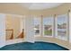 Bedroom with a walk out balcony and stunning views showcasing the abundance of natural light at 4405 Harbor Blvd, Port Charlotte, FL 33952