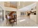 Dining room with staircase to second floor and sliding glass doors to the backyard at 4405 Harbor Blvd, Port Charlotte, FL 33952