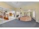 Open concept living area leading to dining and kitchen with natural light at 4405 Harbor Blvd, Port Charlotte, FL 33952
