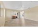 Bright living room features tile floors, ceiling fan, and views of adjacent rooms at 4405 Harbor Blvd, Port Charlotte, FL 33952