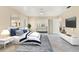 Cozy bedroom with a king-sized bed, en-suite bathroom, and neutral color palette at 4405 Harbor Blvd, Port Charlotte, FL 33952