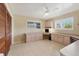 Office featuring custom built-ins for storage, ample workspace, and great natural light at 4405 Harbor Blvd, Port Charlotte, FL 33952