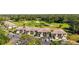 Golf community condos feature lovely landscaping, neutral exteriors, and convenient parking at 4580 Longwater # 61, Sarasota, FL 34235