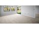 Carpeted bedroom with natural light from large windows and access to outdoor balcony at 4580 Longwater # 61, Sarasota, FL 34235