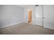 Bedroom with neutral walls, new carpet, and closet at 4580 Longwater # 61, Sarasota, FL 34235