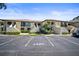 Condos with landscaped yard, private patios, and assigned parking spaces available at 4580 Longwater # 61, Sarasota, FL 34235