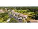 Beautiful condo community with lush greenery, a golf course, and convenient parking at 4580 Longwater # 61, Sarasota, FL 34235