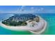 Island home featuring amazing water views, beaches, and lush greenery all around at 4611 17Th W Ave, Bradenton, FL 34209