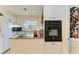 Kitchen featuring an island with granite countertops and modern appliances, exuding warmth and comfort at 4611 17Th W Ave, Bradenton, FL 34209