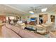Spacious living room features wood floors, comfortable seating, and access to multiple rooms at 4611 17Th W Ave, Bradenton, FL 34209