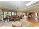 Bright living room showcases wood floors, natural light, and comfortable furnishings at 4611 17Th W Ave, Bradenton, FL 34209
