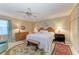 Inviting bedroom with neutral tones, ceiling fan, and a cozy rug at 4611 17Th W Ave, Bradenton, FL 34209