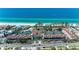 Breathtaking aerial view of the beachside community with private beach access at 5055 Gulf Of Mexico Dr # 232, Longboat Key, FL 34228