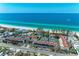 An aerial view highlighting the proximity to the beach at 5055 Gulf Of Mexico Dr # 232, Longboat Key, FL 34228