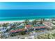 Stunning aerial view showcasing the beachside property at 5055 Gulf Of Mexico Dr # 232, Longboat Key, FL 34228