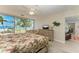 Bright main bedroom with Gulf views and slider to the balcony at 5055 Gulf Of Mexico Dr # 232, Longboat Key, FL 34228