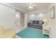 Quiet room featuring comfortable seating, accent lighting, and access to kitchen at 5055 Gulf Of Mexico Dr # 232, Longboat Key, FL 34228