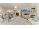 Open-concept living room with direct views and access to kitchen and living areas at 5055 Gulf Of Mexico Dr # 232, Longboat Key, FL 34228