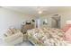 Comfortable main bedroom featuring a cozy sitting area, stylish decor, and neutral colors at 5055 Gulf Of Mexico Dr # 232, Longboat Key, FL 34228