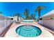 Community pool area featuring a spa, swimming pool, tables, chairs, and lounge furniture at 5055 Gulf Of Mexico Dr # 232, Longboat Key, FL 34228