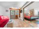 Open bedroom with light-filled living area, tiled floors, and stylish furnishings at 528 45Th St, Sarasota, FL 34234