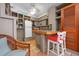 Charming kitchen featuring custom cabinets, an island counter, and stainless steel appliances at 528 45Th St, Sarasota, FL 34234