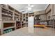 Bright kitchen featuring gray cabinets, granite countertop, and open shelving at 528 45Th St, Sarasota, FL 34234