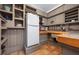 A rustic kitchen, showcasing cabinets, granite countertops, and a spacious layout at 528 45Th St, Sarasota, FL 34234