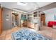 Spacious primary bedroom featuring natural light, storage, closet, and stylish decor at 528 45Th St, Sarasota, FL 34234