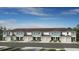 New townhouse community with attached garages and attractive landscaping in a suburban setting at 5897 Biscotti St, Nokomis, FL 34275