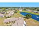 Community features a lake with a fountain, manicured green spaces, and residential buildings at 6209 Heritage Ln # 6209, Bradenton, FL 34209