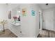 Stylish interior featuring a granite counter, white walls, and trendy decor with wood-look flooring at 6209 Heritage Ln # 6209, Bradenton, FL 34209
