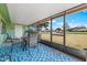 Enclosed patio area with outdoor seating and view of the lawn at 6209 Heritage Ln # 6209, Bradenton, FL 34209