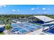 Aerial view of a state of the art pickleball facility with multiple well-maintained courts and a shaded pavilion at 6209 Heritage Ln # 6209, Bradenton, FL 34209