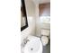 Bright bathroom featuring white fixtures and a neutral color scheme for a clean and modern look at 624 19Th W St, Bradenton, FL 34205