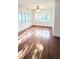 Spacious bedroom featuring hardwood floors and large windows for ample natural light at 624 19Th W St, Bradenton, FL 34205