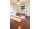 Bright bedroom with hardwood flooring, a ceiling fan, and french doors at 624 19Th W St, Bradenton, FL 34205