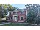 Charming two-story home with mature trees and traditional architecture provides unique curb appeal at 624 19Th W St, Bradenton, FL 34205