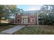Charming two-story home with mature trees and traditional architecture provides unique curb appeal at 624 19Th W St, Bradenton, FL 34205